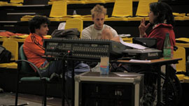 Fabrice is talking to Alex and Matias, giving them advice Fabrice is talking to Alex and Matias, giving them advice