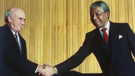 Frederik Willem De Klerk and Nelson Mandela shaking hands 