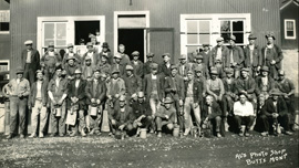 A group of Butte miners outside Al's Photo Shop, 1930s