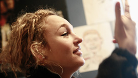 Aneta Brodski (college age) in conversation with a former classmate