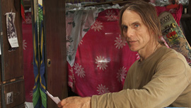 Jeffrey reading his Donor 150 profile on camera