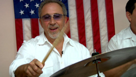Emilio Estefan, music producer, jamming with the band at a rehearsal