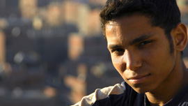 Adham, 17 years old, one of teenage boys featured in Garbage Dreams