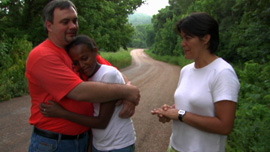 Weynsht and her parents, soon after her adoption. 