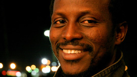 Solo (Souléymane Sy Savané), a Senegalese taxi driver in Winston-Salem, North Carolina