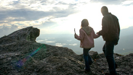 Solo and Alex (Diana Franco Galindo) walk on the mountaintop