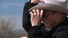Marshall Larry Cearly, the sheriff of Magdalena, New Mexico, keeps watch. 