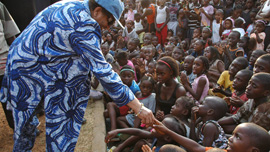 President of Liberia Ellen Johnson Sirleaf in a sea of children