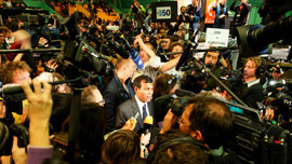 President Mohamed Nasheed is mobbed by the press following his speech at a 350.org rally.