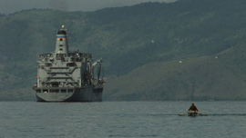 Big Ship, small boat