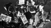 Protesters break a curb in the mid-1980s