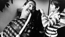 Ed Roberts with his son Lee in the early 1980s 