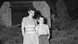 Vashti and Jim McCollum in front of their house. Vashti and Jim McCollum in front of their house.