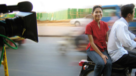 Socheata Poeuv on a moto in Phnom Pen