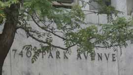 740 Park Avenue façade obscured by tree branches