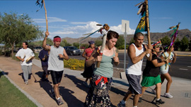 Students and community members participate in a traditional ceremonial run from Tucson to Phoenix