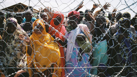 Somalian refugees wave at Kakuma Refugee Camp, Kenya Somalian refugees wave at Kakuma Refugee Camp, Kenya