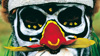 Close up on face of Papua New Guinean man with traditional face paint 
