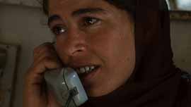 Rafea at Barefoot College talking on the phone with her husband Alian