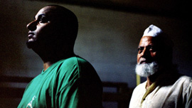 Imran Uddin and his father, Riaz Uddin, at the family's halal slaughterhouse