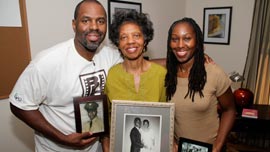 Filmmaker Byron Hurt with his mother, Frances Hurt, and sister, Taundra Hurt