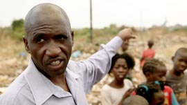 A man in Mopani points out the plant. A man in Mopani points out the plant.