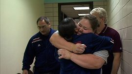 Haworth hugs friend Cara Heads after making her lifts, 2005