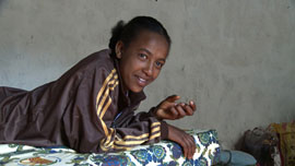 Hawii lying on bed at her running club in Woliso Hawii lying on bed at her running club in Woliso