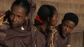 Girl athletes sitting outside their accomodation in Woliso running club, Ethiopia Girl athletes sitting outside their accomodation in Woliso running club, Ethiopia