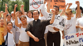 Mimi C. Nguyen, Father Luke Nguyen, and Versailles youth celebrate victory at the Chef Menteur Landfill protest, 2006