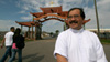 Father Vien Nguyen watches as young parishioners arrive at Church, 2009