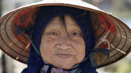 Versailles gardener takes a moment away from her work, 2006