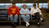 Jerry Mundy, Joan Gaudet, and Bill Knight waiting at the airport