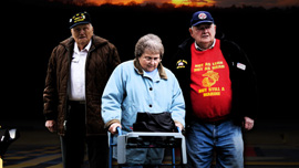 Bill Knight, Joan Gaudet, and Jerry Mundy leave the airport