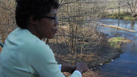 Miss Beverly looks at the falls. 