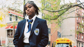 Sharifea strikes a defiant pose standing outside of school