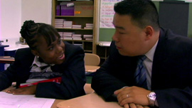 Principal Tom tutors Sharifea in mathematics