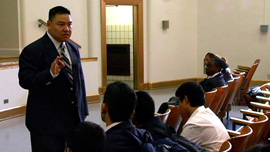 Principal Tom urges students to commit to being scholars