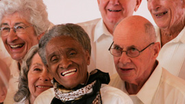 Young@Heart chorus members say "Cheese!" 