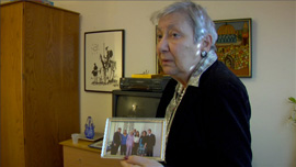 Lee with a family photo