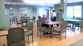 Lee sitting alone in the dinning room